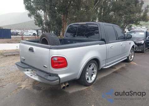 2003 Ford F-150 Lariat z USA, uszkodzony, nr VIN 1FTRW07323KD04865